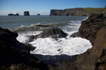 The rock formations and black lava sand at the south coast, Vík