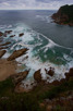 Rock formations and stormy waters around Knysna Heads