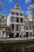 Old beautiful dutch house at the canals, Amsterdam