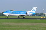 The dutch manufactured Fokker 70 in the colors of national airline of KLM Royal Dutch Airlines at Schiphol