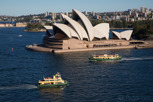 Sydney Opera House and Sydney Ferries as seen from Harbour Bridge, New South Wales
