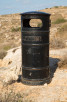 Black litter-bin at the country side, Malta