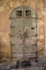Time worn street door, Valletta