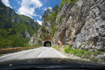 Mountainous roads with tunnels along the fjords