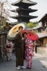 Japanese couple in front of Hokanji pagoda, Kyoto