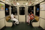 Japanese women in kimonos at local train, Kyoto