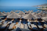 Straw parasols and sun beds at Santa Quaranta Resort, Sarandë