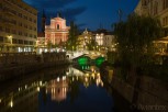 Triple Bridge crossing Ljubljanica River with Franciscan Church of the Annunciation, Ljubljana