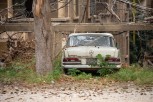 Abandoned old Mercedes among some building ruins, Beirut