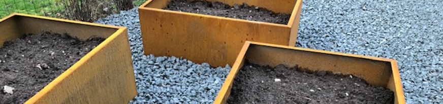 Odlinslåor i corten, plåt som rostat Odlinslåor i corten, plåt som rostat