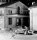 56. Här ses lite oskarpt ,skylten , uppsatt vid förådshus till Dahlins järnhandel. foto 1963